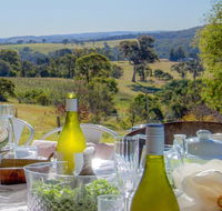 The Farmhouse - grape vines and rolling green hills - Australian Destinations
